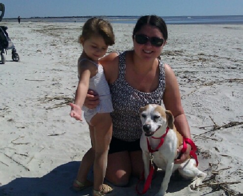 Arena with her family at the beach