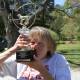 Mama Donna kissing Wag-a-Lot award